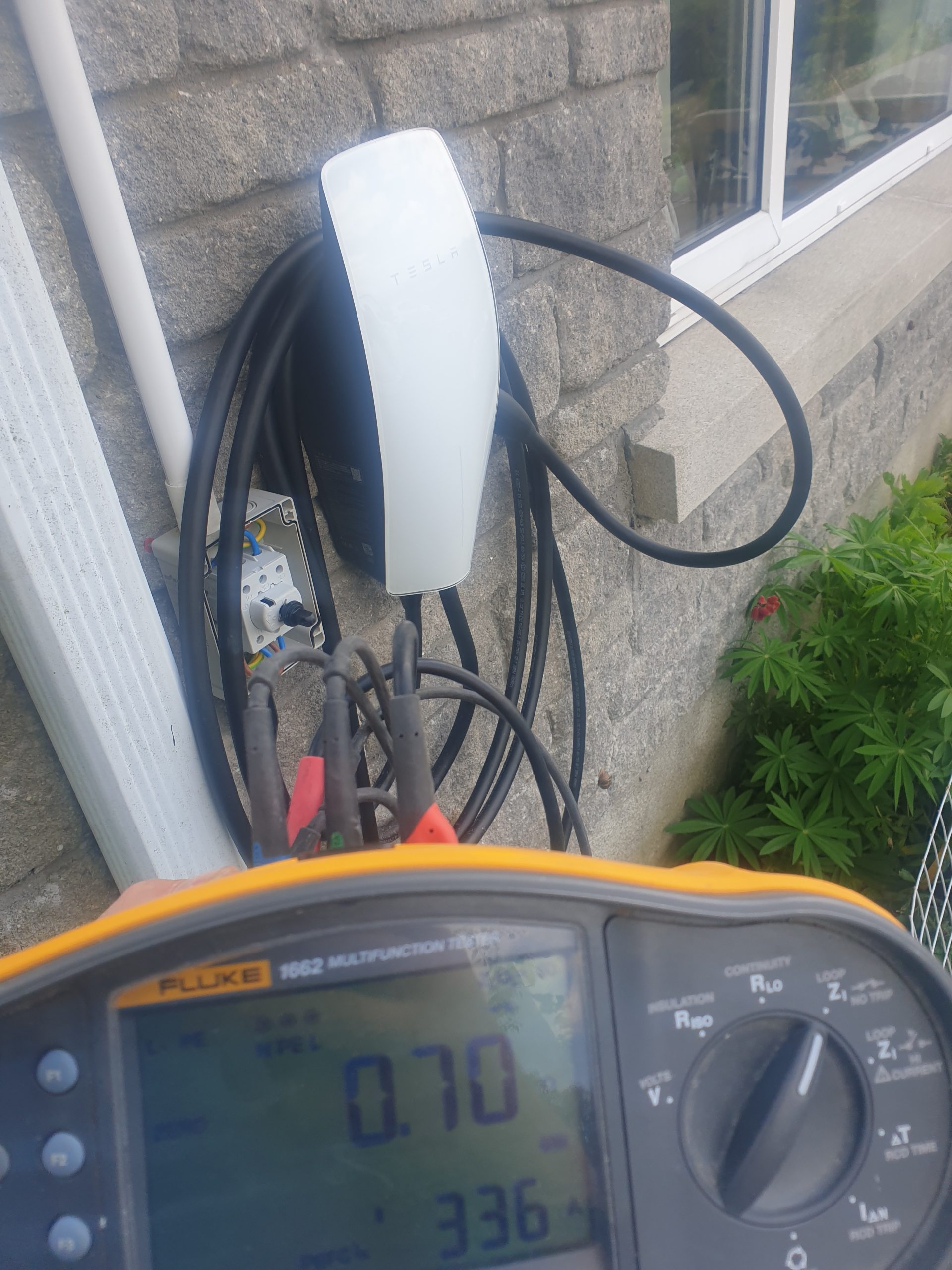 EV charger undergoing electrical testing