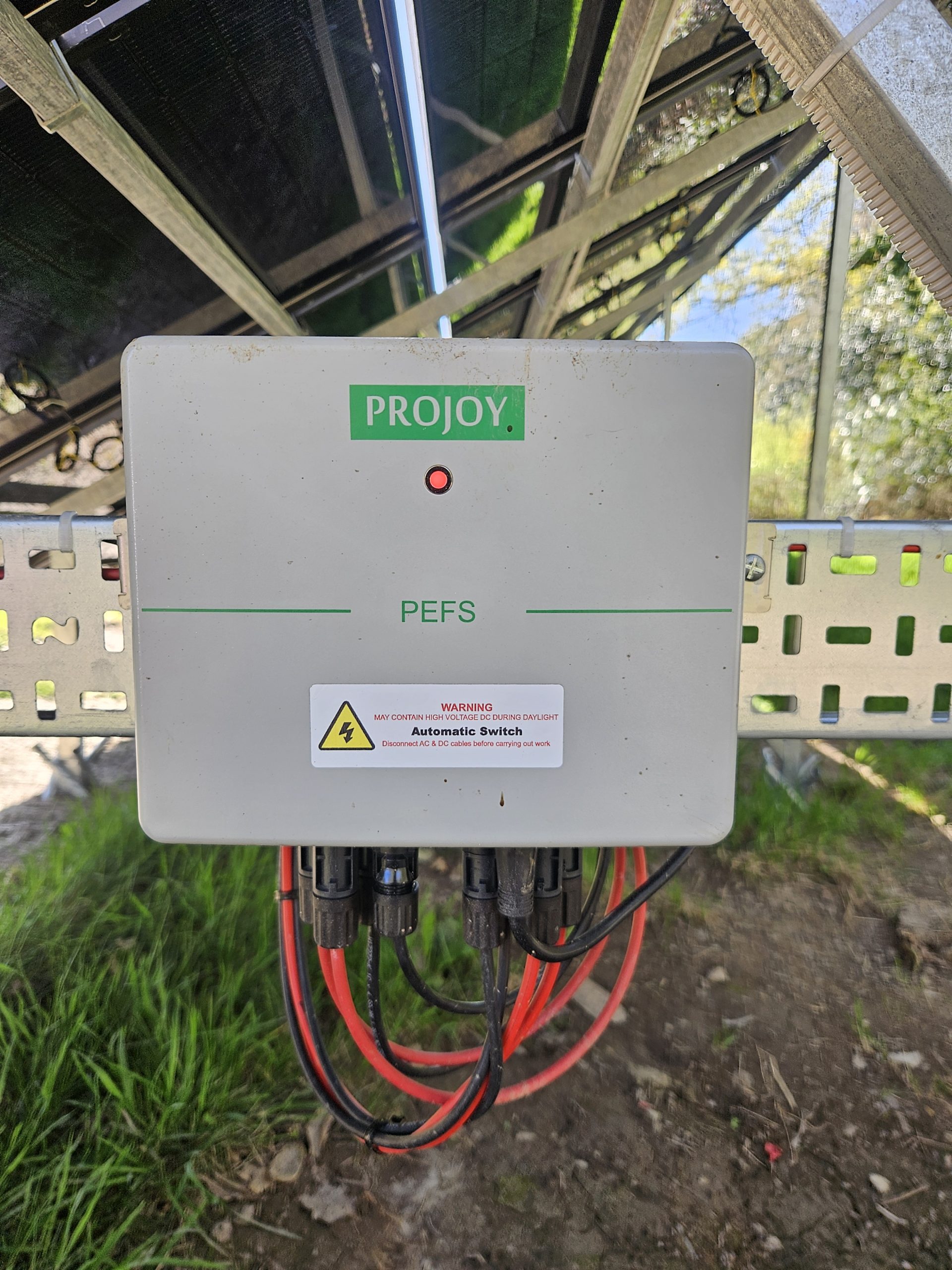 Solar DC switching equipment beneath a COFAB panel array